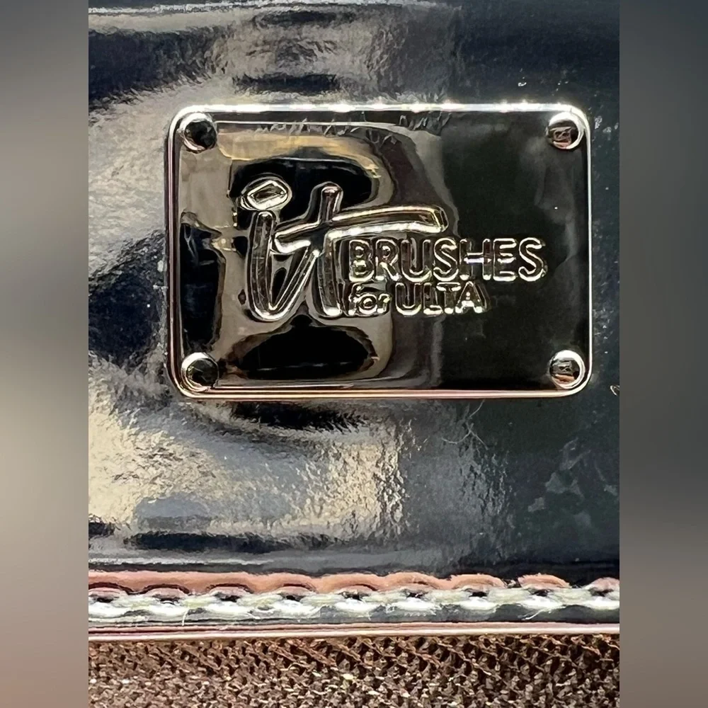 It Cosmetics rose gold and silver makeup bag